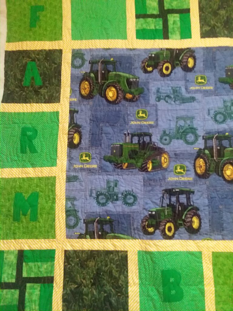 John Deere quilted with grass